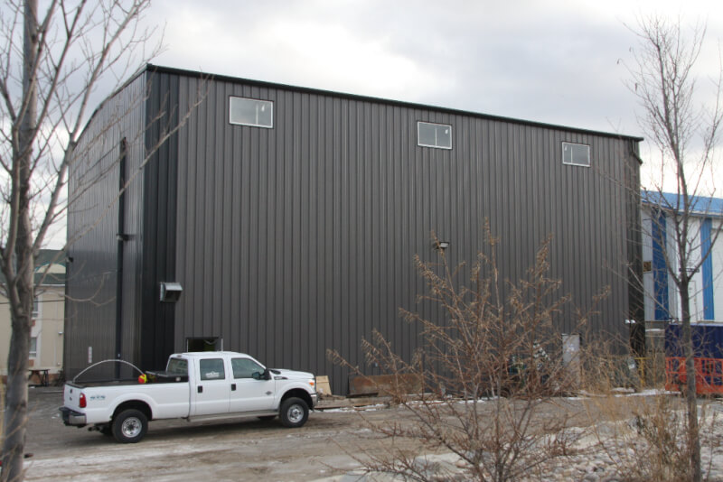 Industrial Building with large hydraulic door on endwall