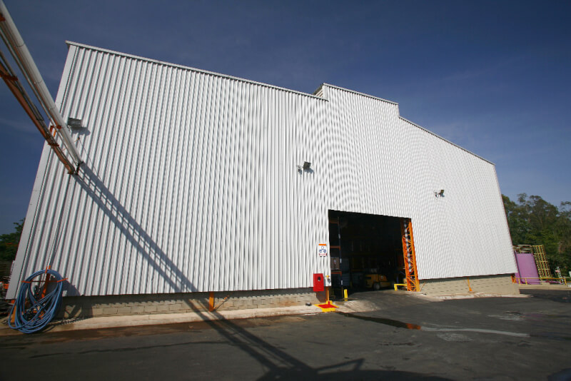 large metal building exterior image with silver coloured sheeting