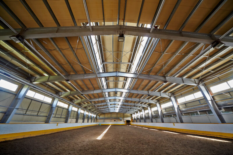 photo of interior clear span riding arena