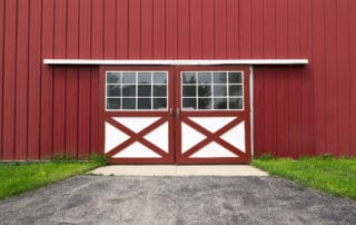 Image of by-parting man doors on Metal Pole Barn