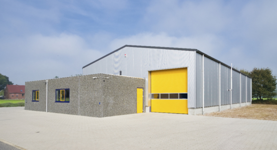steel storage building with flat roof office at from endwall