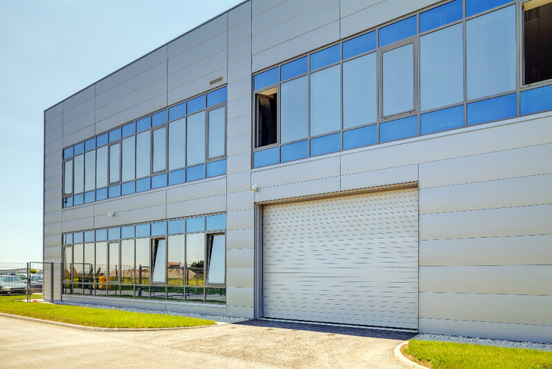 Commercial Metal Building with ribbon windows and aluminum faced insulated panels