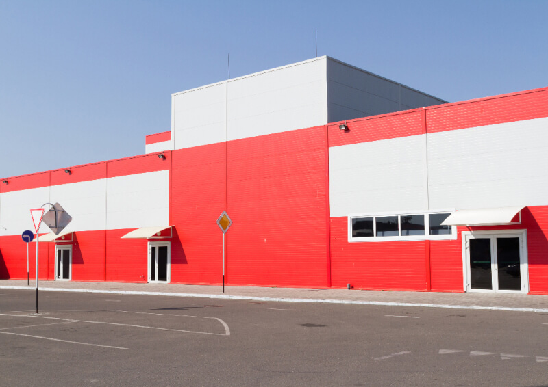 Commercial Metal Building with extensive use of textured insulated panels
