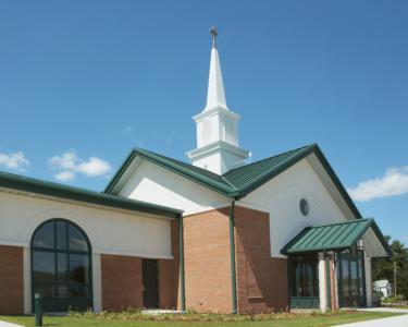 image of upscale Church building with multiple roof pitches