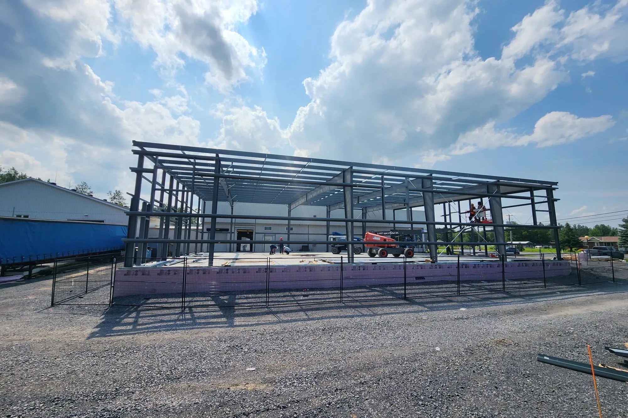 Erected steel building frame on a prepared site